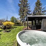 A Tiny House With A Garden And A Hot Tube