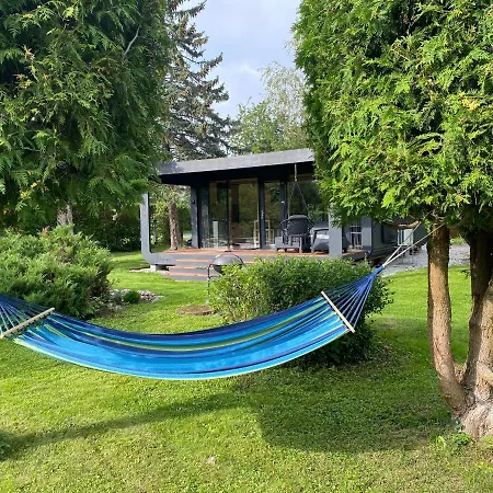 A Tiny House With A Garden And A Hot Tube