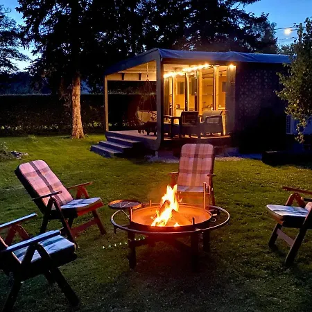 A Tiny House With A Garden And A Hot Tube Pringi