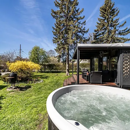 A Tiny House With A Garden And A Hot Tube