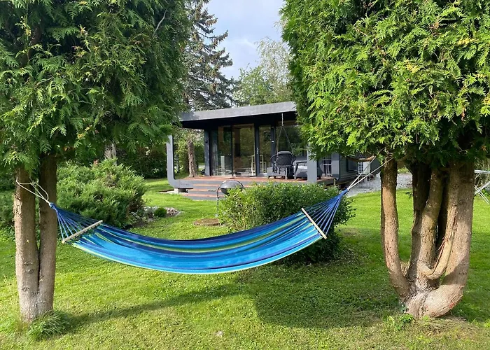 A Tiny House With A Garden And A Hot Tube