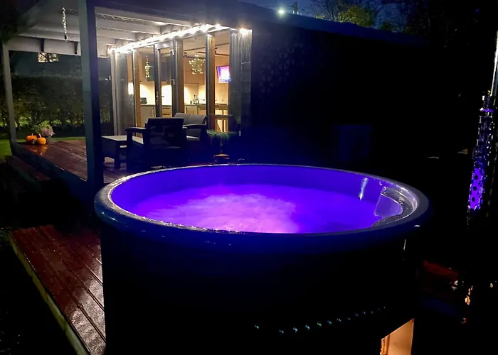 A Tiny House With A Garden And A Hot Tube