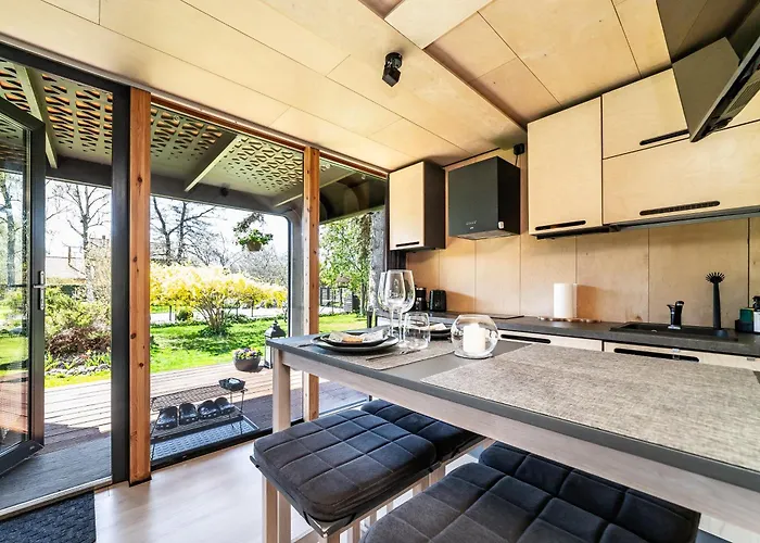 A Tiny House With A Garden And A Hot Tube Pringi