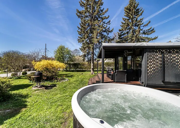 A Tiny House With A Garden And A Hot Tube