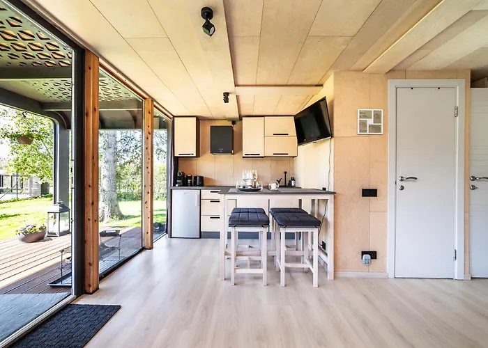 Сasa de vacaciones A Tiny House With A Garden And A Hot Tube Pringi